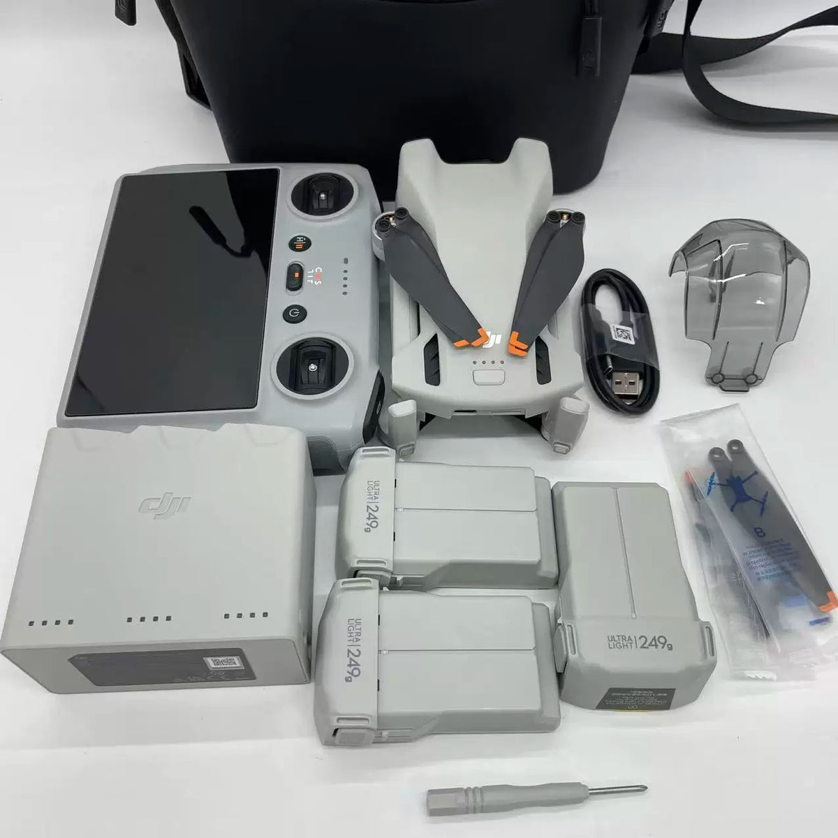 DJI Mini 3 Combo with Screen Remote (DJI RC) – open box, grade B – photo 1