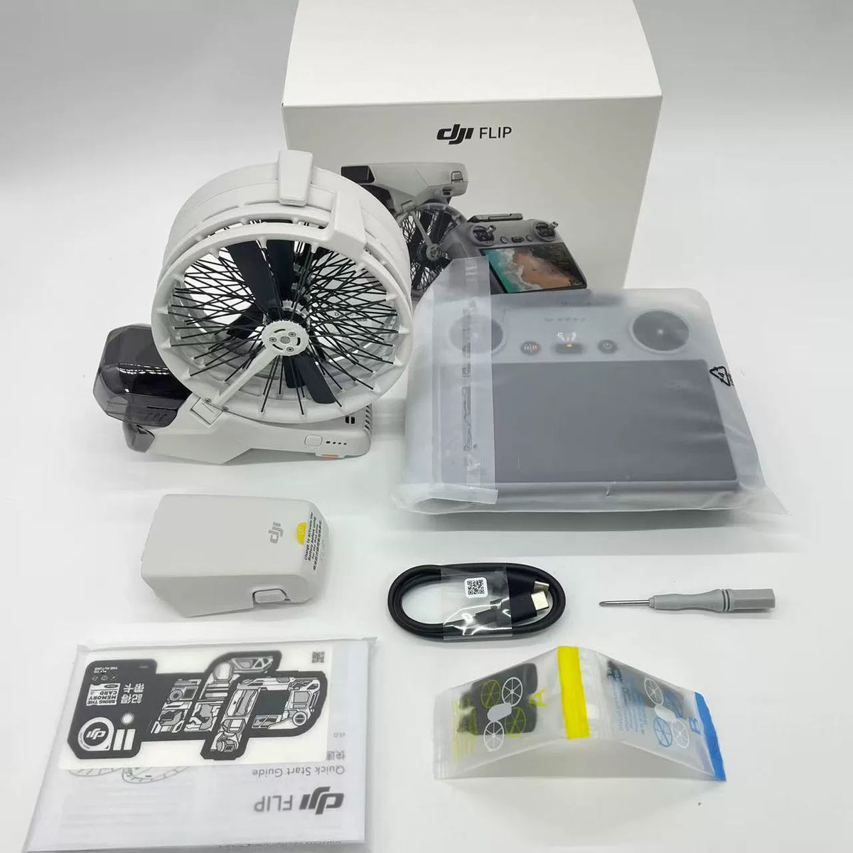 DJI Flip Standard Combo with Screen Remote (DJI RC) Under DJI Warranty – open box, grade B – photo 1
